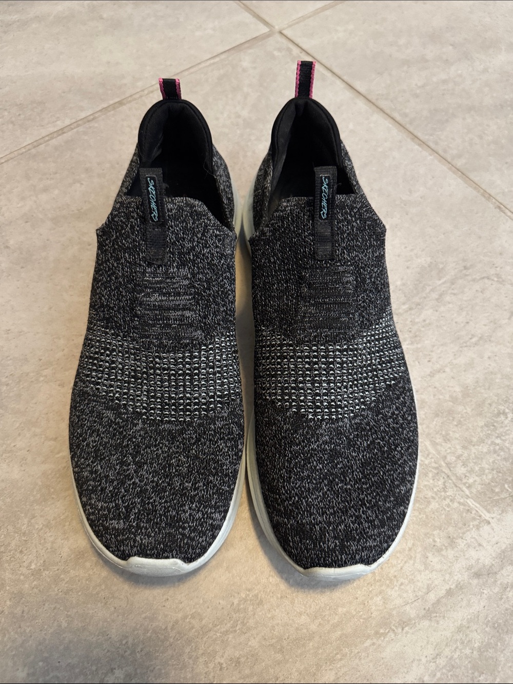 Skechers Knit Slip-On Sneakers in Black with Pink Pull Tabs